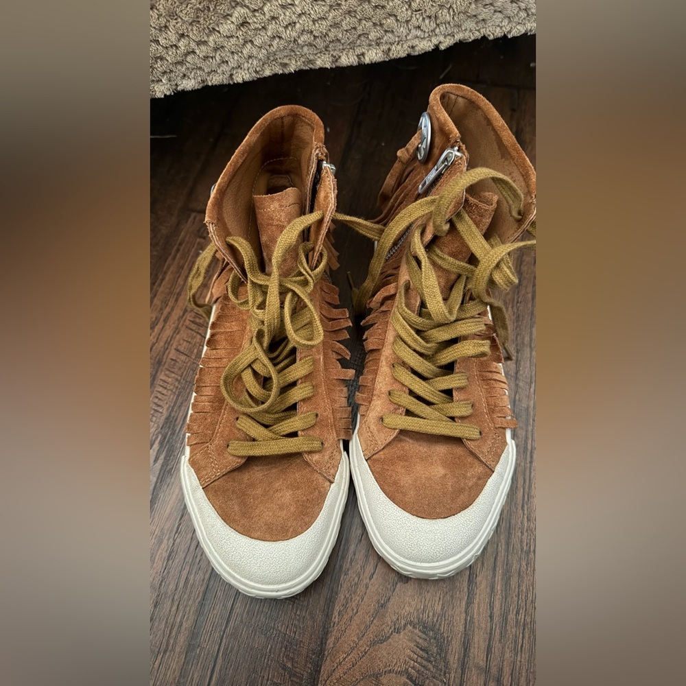 The sneakers are the ASH Marlow Fringe Lace Up High Top Sneakers. Size 38 - Picture 9 of 16